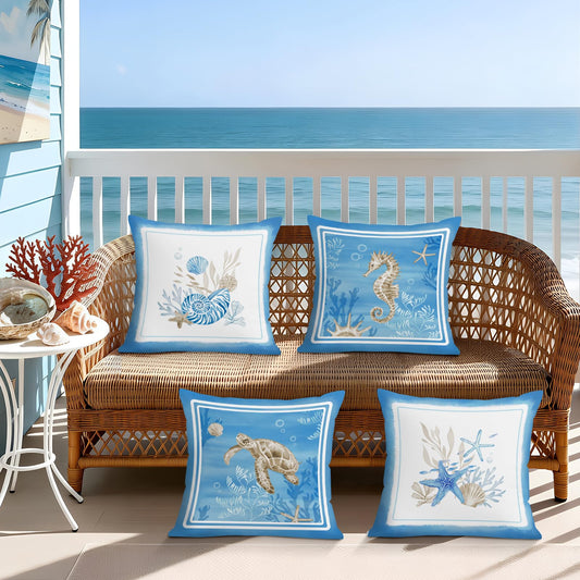 Lot de quatre housses de coussin en velours à motifs marins