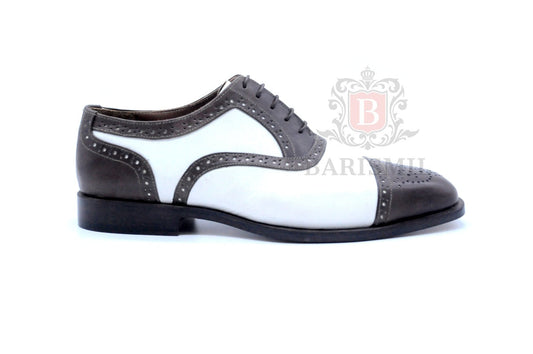Oxford spectator bicolore brogues — construction Goodyear welt, cuir premium