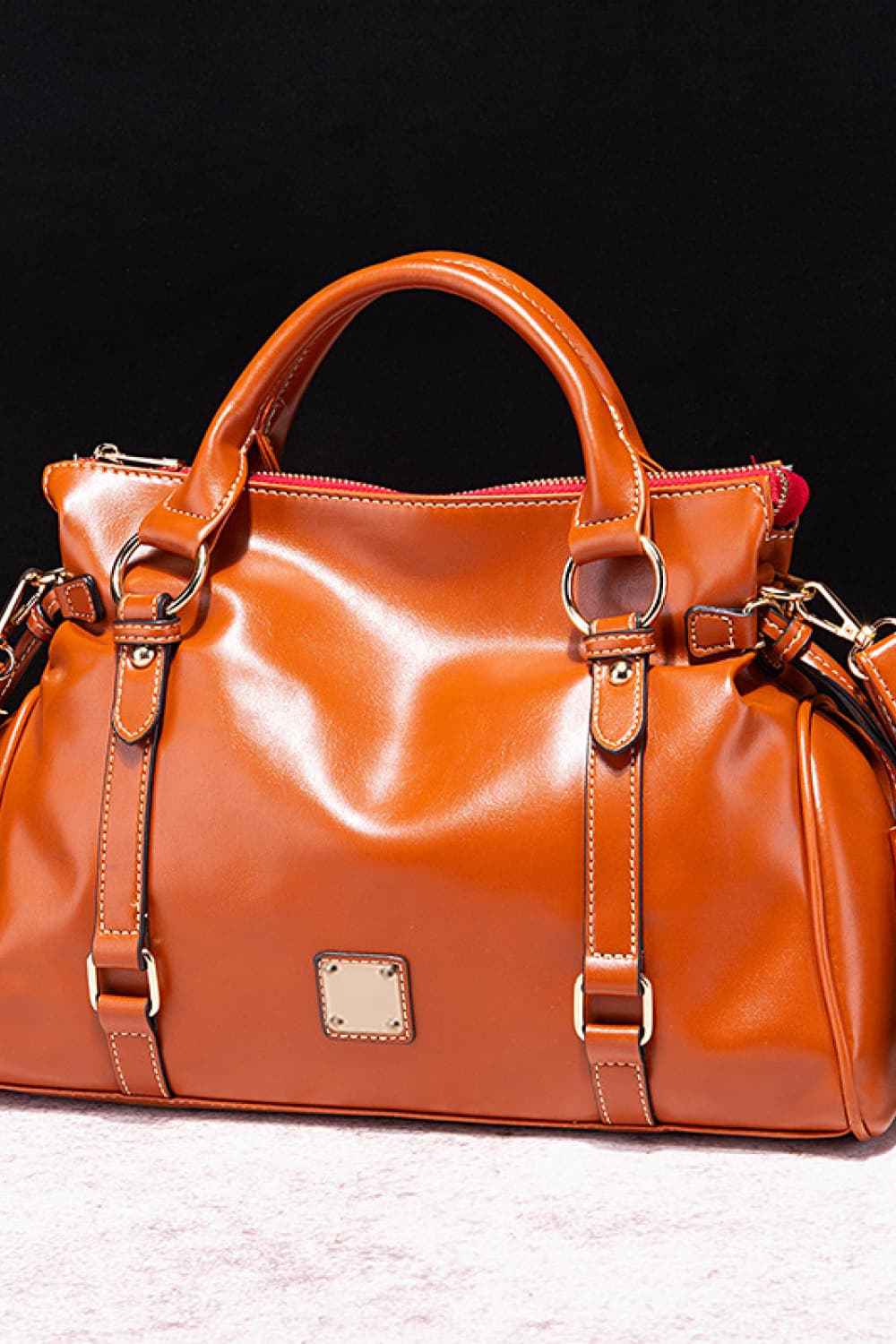 Sac à main en cuir à pompons