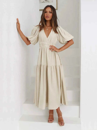 Robe midi croisée à étages et manches mi-longues
