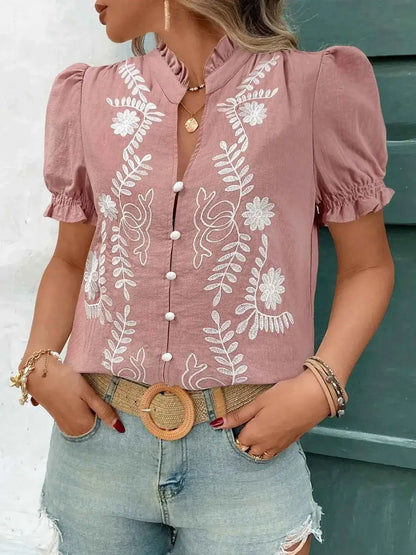Blouse en coton à col cranté, broderies et volants, manches courtes