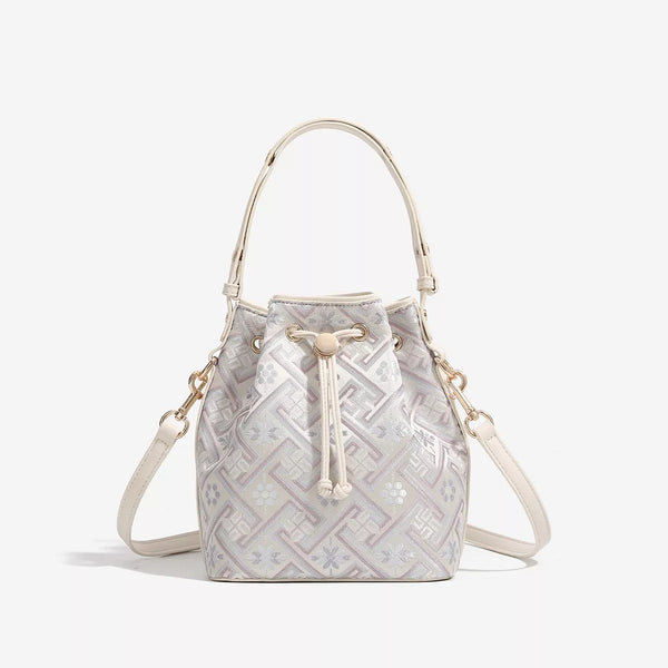 Sac seau bandoulière à cordon motif géométrique — crème