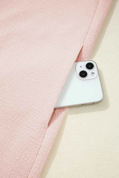 Mini-robe à volants et nœud dans le dos