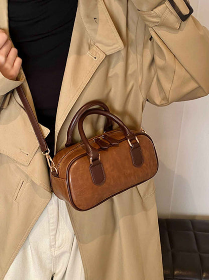 Sac bandoulière tonneau style vintage