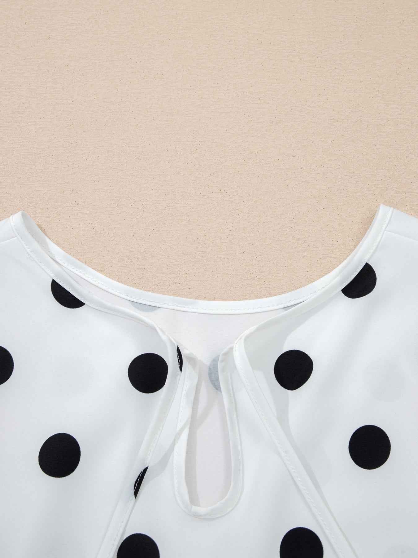 Blouse à pois manches longues