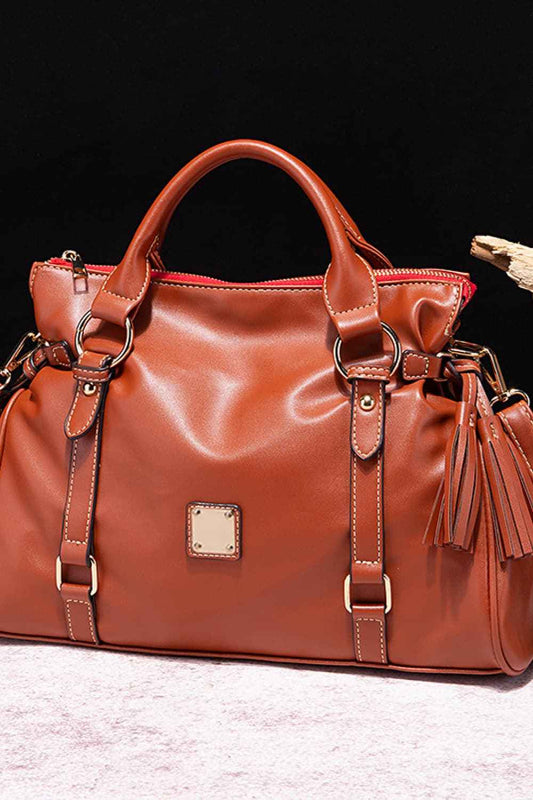Sac à main en cuir à pompons
