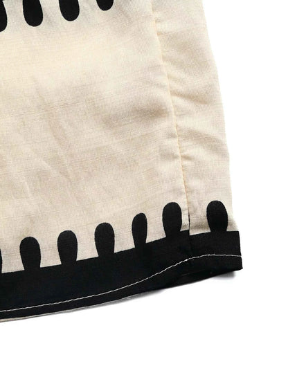 Robe à bretelles larges smockée et volants étagés