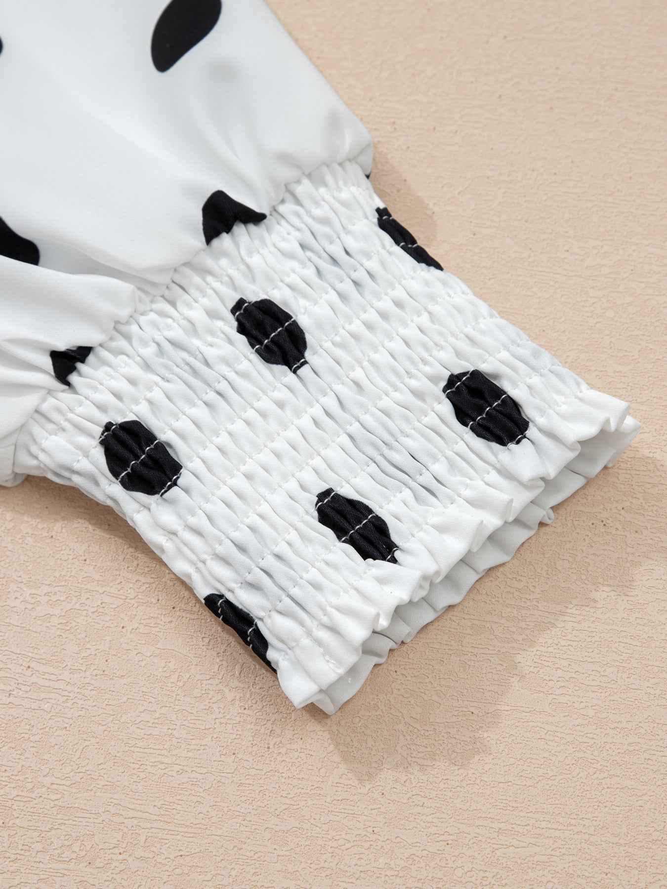 Blouse à pois manches longues