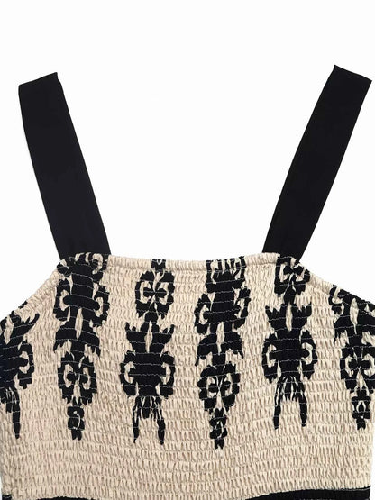 Robe à bretelles larges smockée et volants étagés