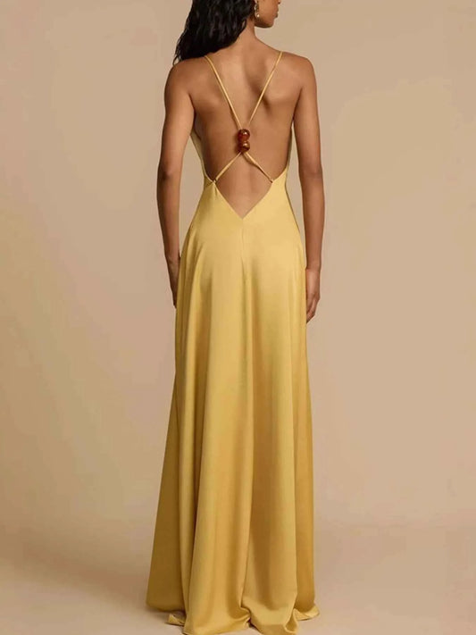 Robe maxi col V profond, dos nu et croisé dans le dos