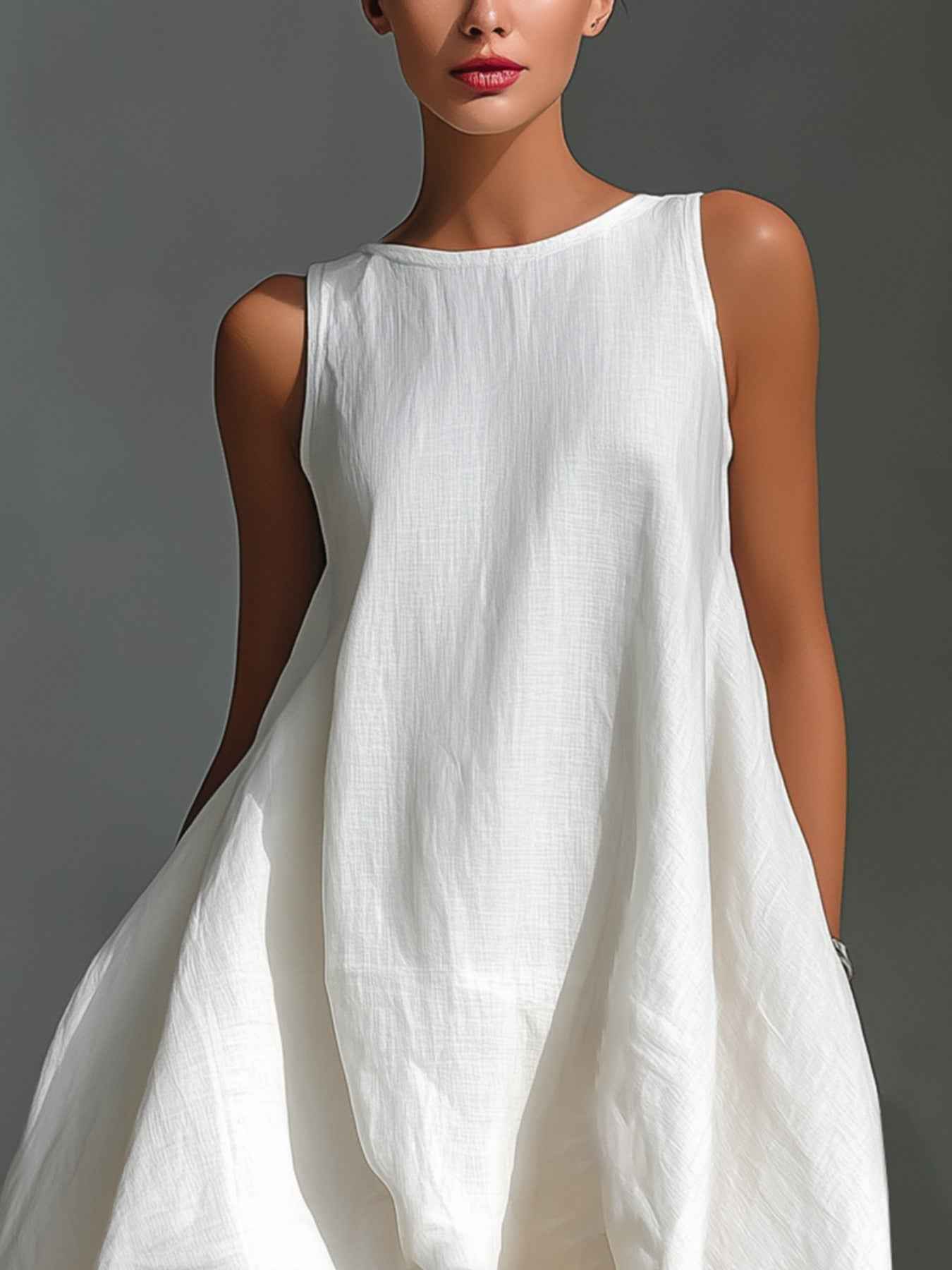 Robe sans manches à ourlet asymétrique