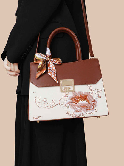 Sac à main en cuir de vachette à ornement floral