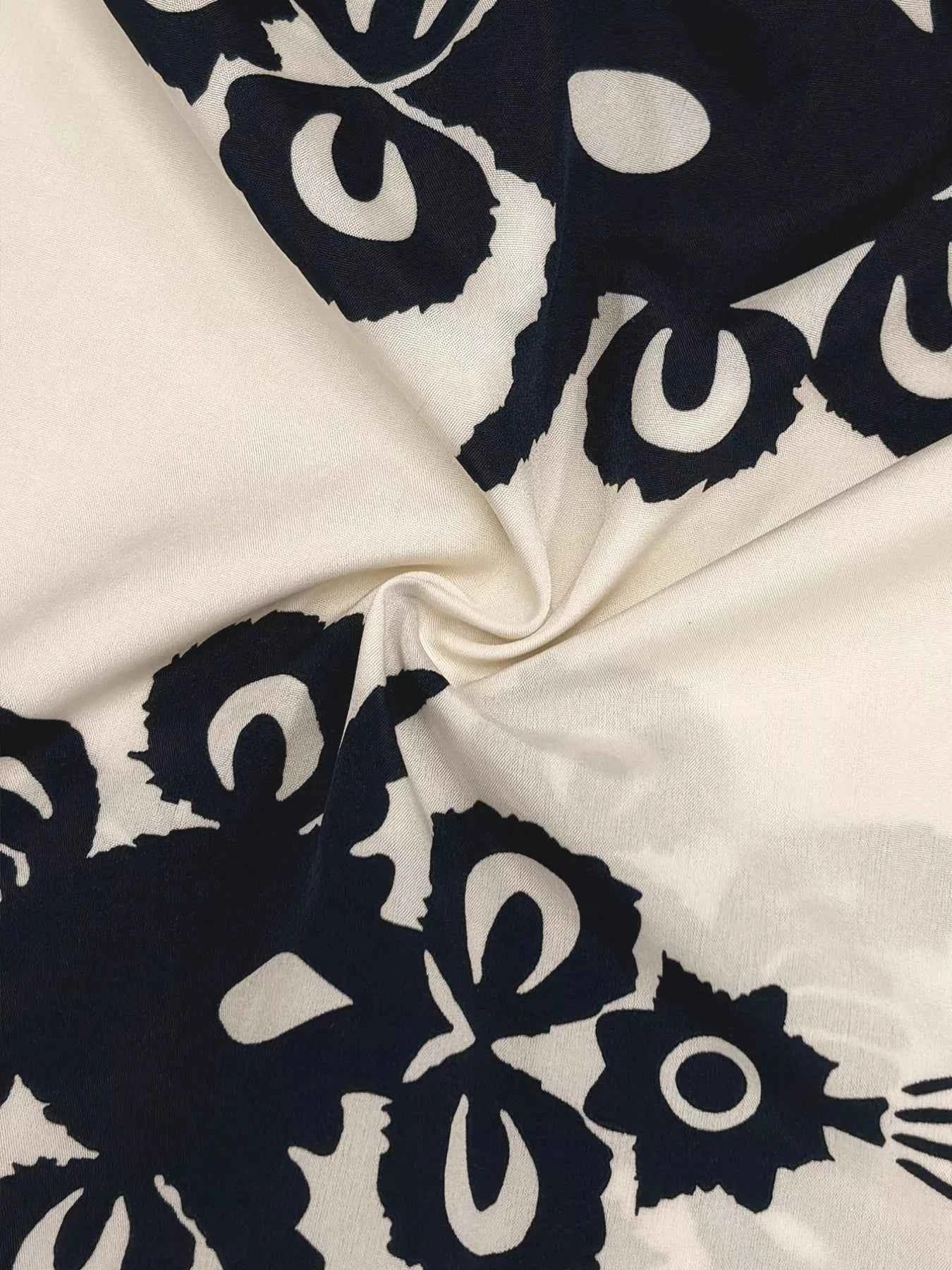 Robe midi bohème à imprimé et volants étagés