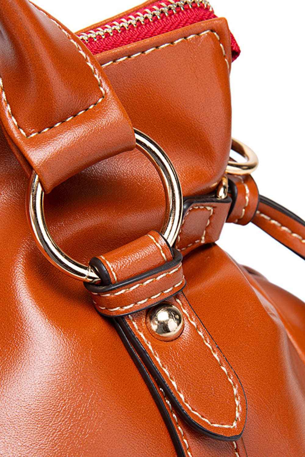 Sac à main en cuir à pompons