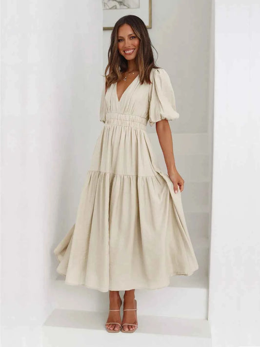 Robe midi croisée à étages et manches mi-longues