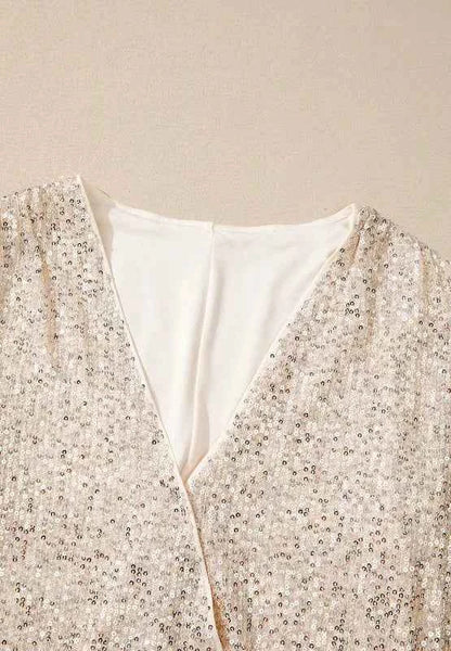 Body à manches longues col croisé et sequins