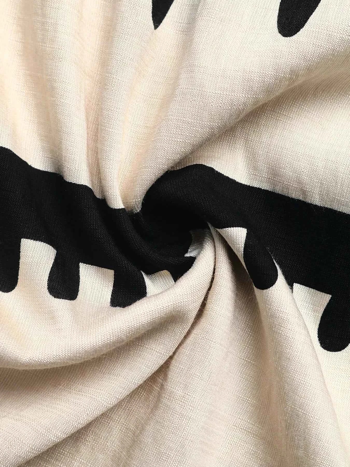 Robe à bretelles larges smockée et volants étagés