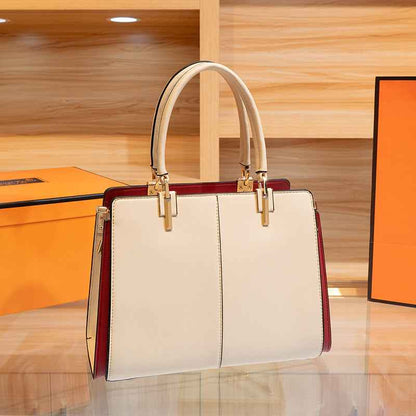 Sac à main brodé à poignée en cuir abricot