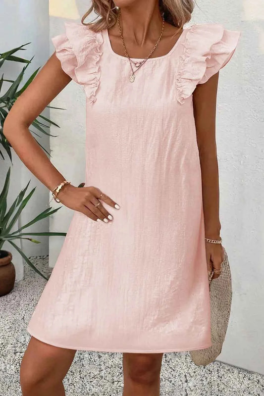Mini-robe à volants et nœud dans le dos