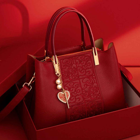 Sac à main gauffré à poignée en cuir rouge