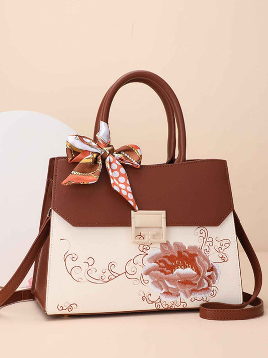 Sac à main en cuir de vachette à ornement floral
