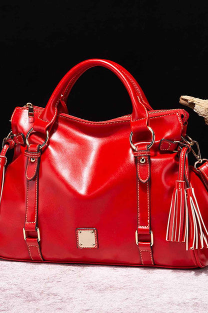 Sac à main en cuir à pompons