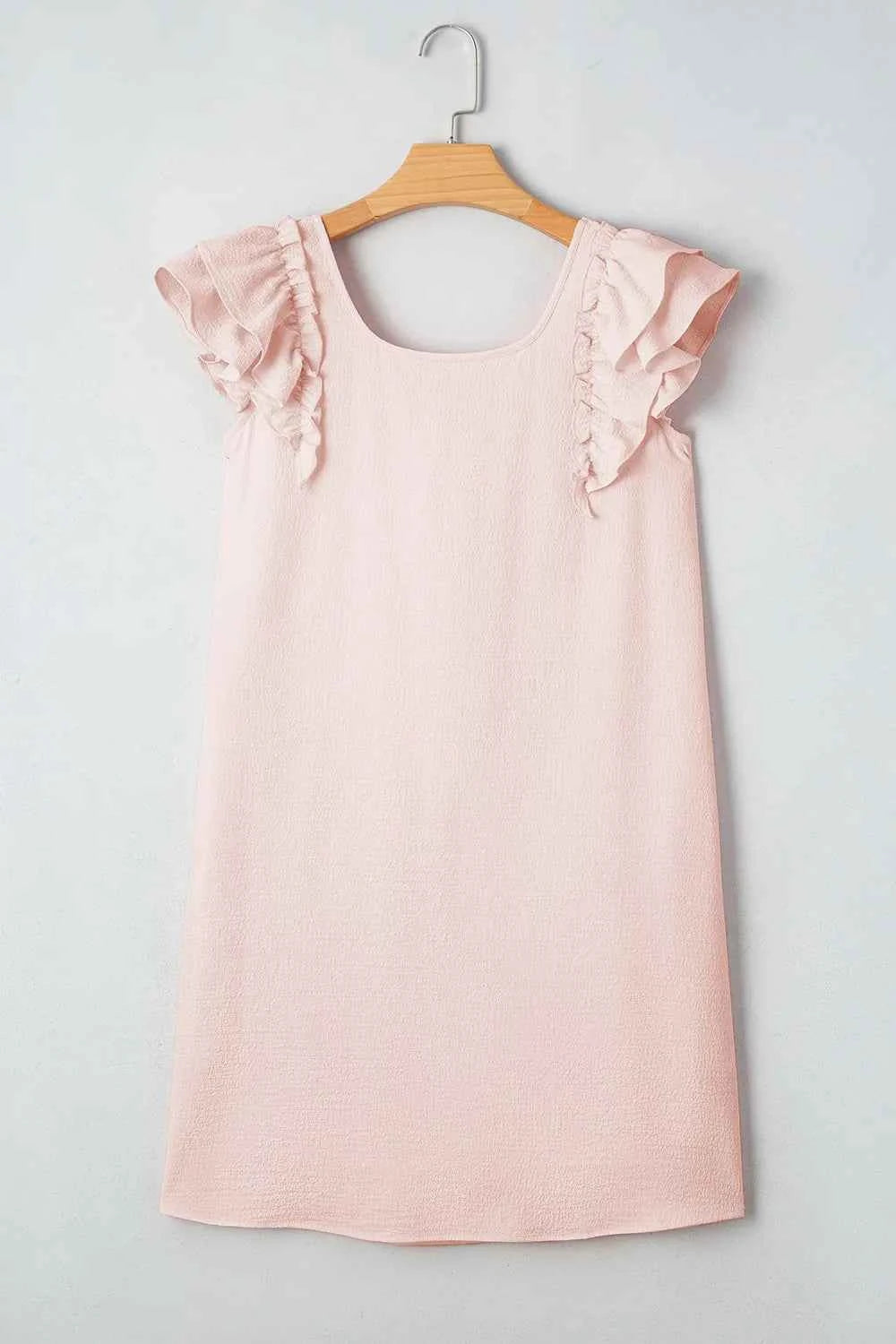 Mini-robe à volants et nœud dans le dos