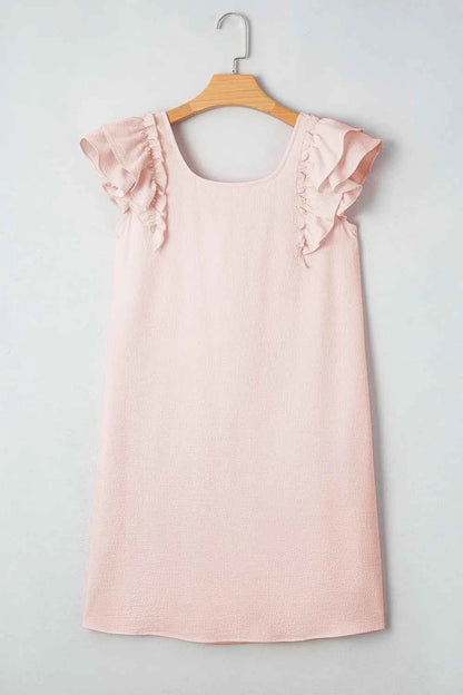 Mini-robe à volants et nœud dans le dos