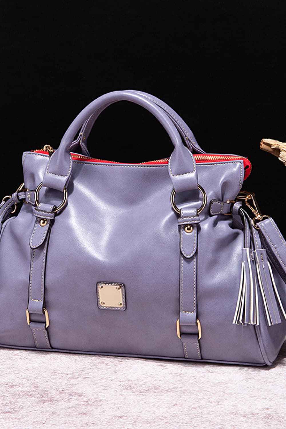 Sac à main en cuir à pompons