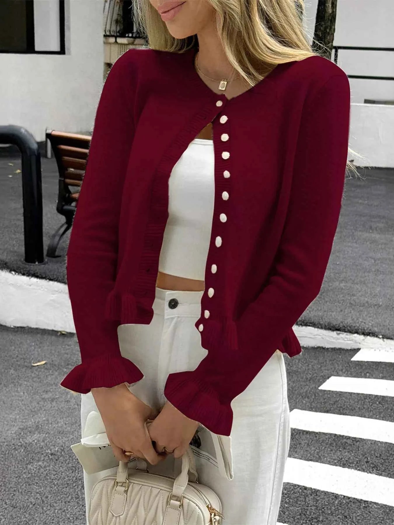 Cardigan en maille boutonné à volants