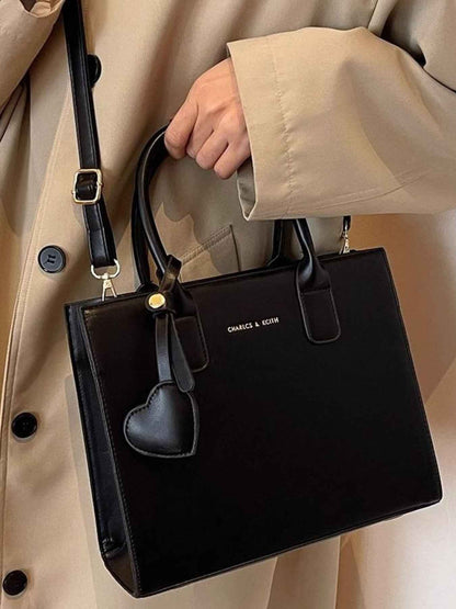 Sac bandoulière à poignée supérieure en cuir