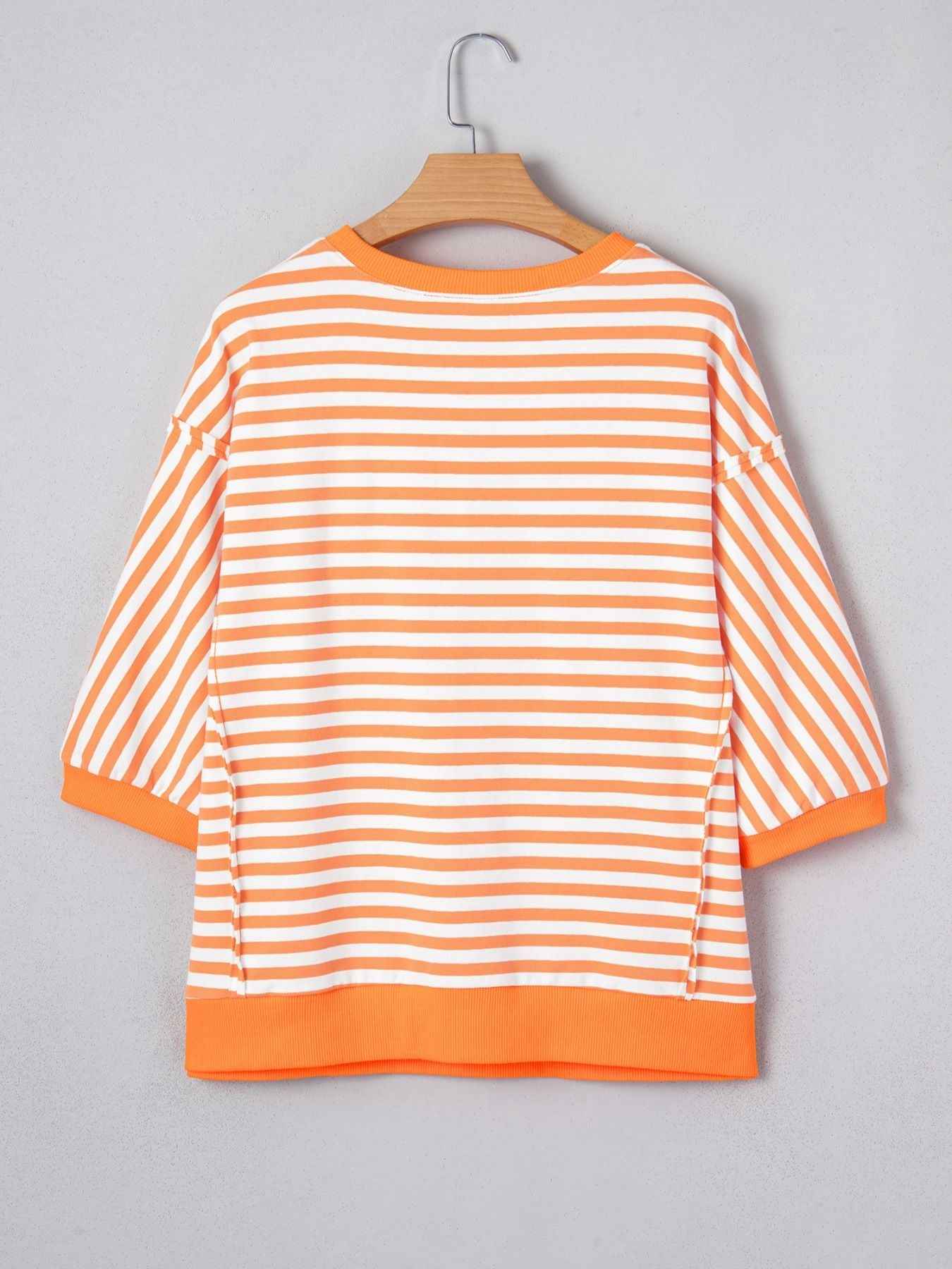 Pull patchwork à manches 3/4 et coutures apparentes