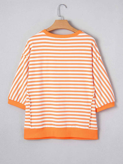 Pull patchwork à manches 3/4 et coutures apparentes
