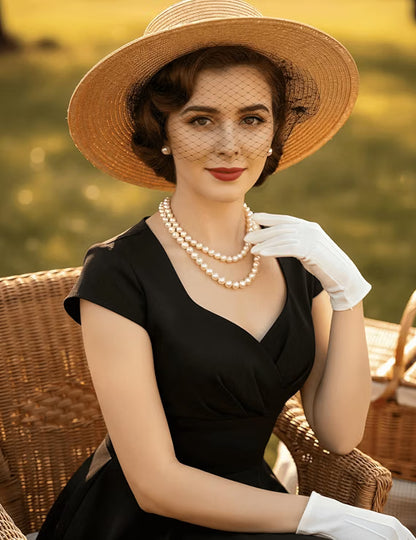 Robe vintage ligne A col en V — coton et élasthanne, noir