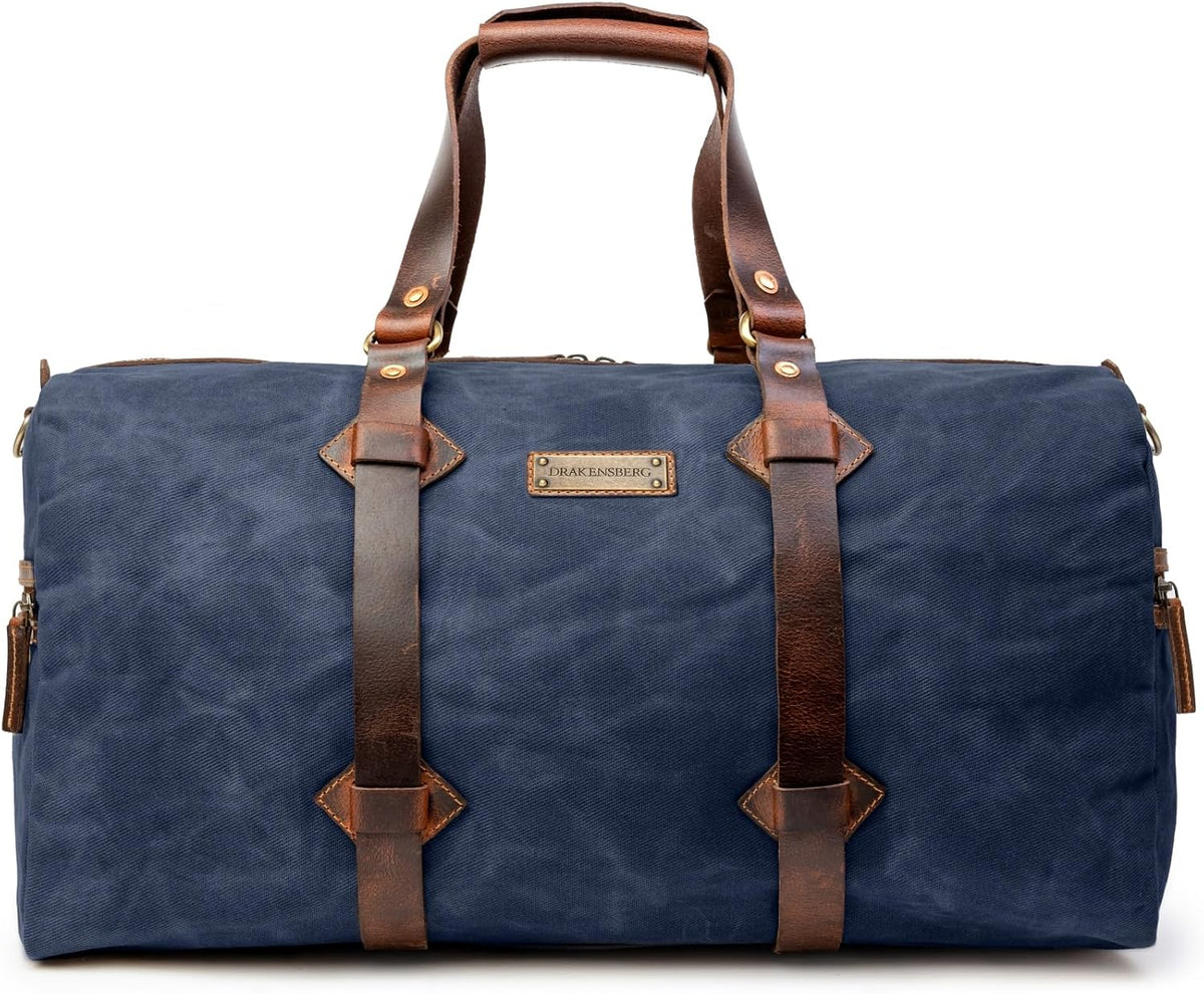 Sac de voyage Drakensberg modèle Cody, toile cirée et cuir de buffle tanndé végétal 50 L — bleu océan, kaki sable, vert forêt