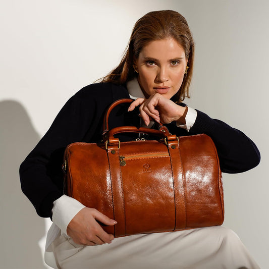 Sac de voyage en cuir pleine fleur Time Resistance, fait main en Italie — cognac, noir, marron