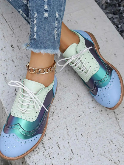 Mocassins bicolores bout rond plates