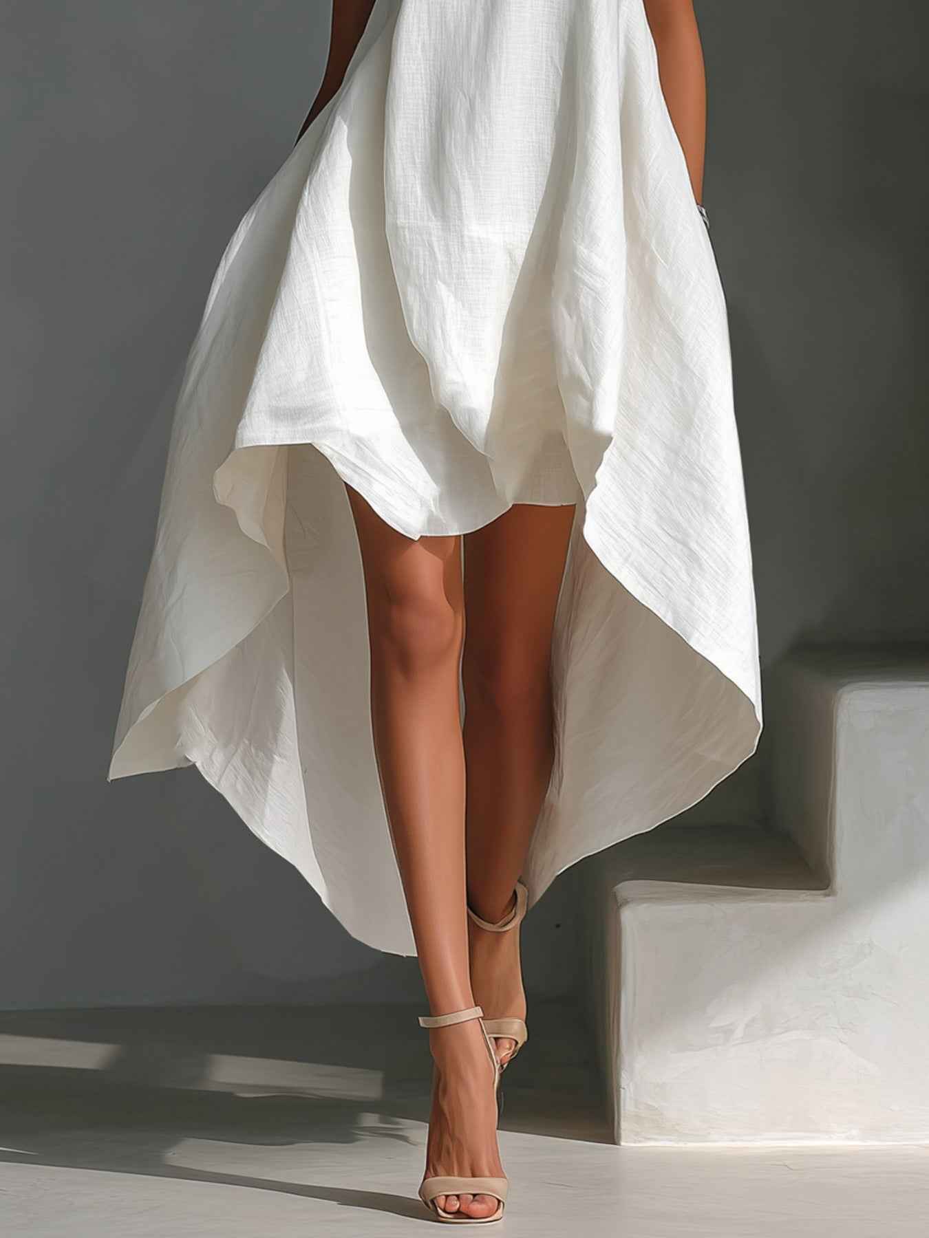 Robe sans manches à ourlet asymétrique