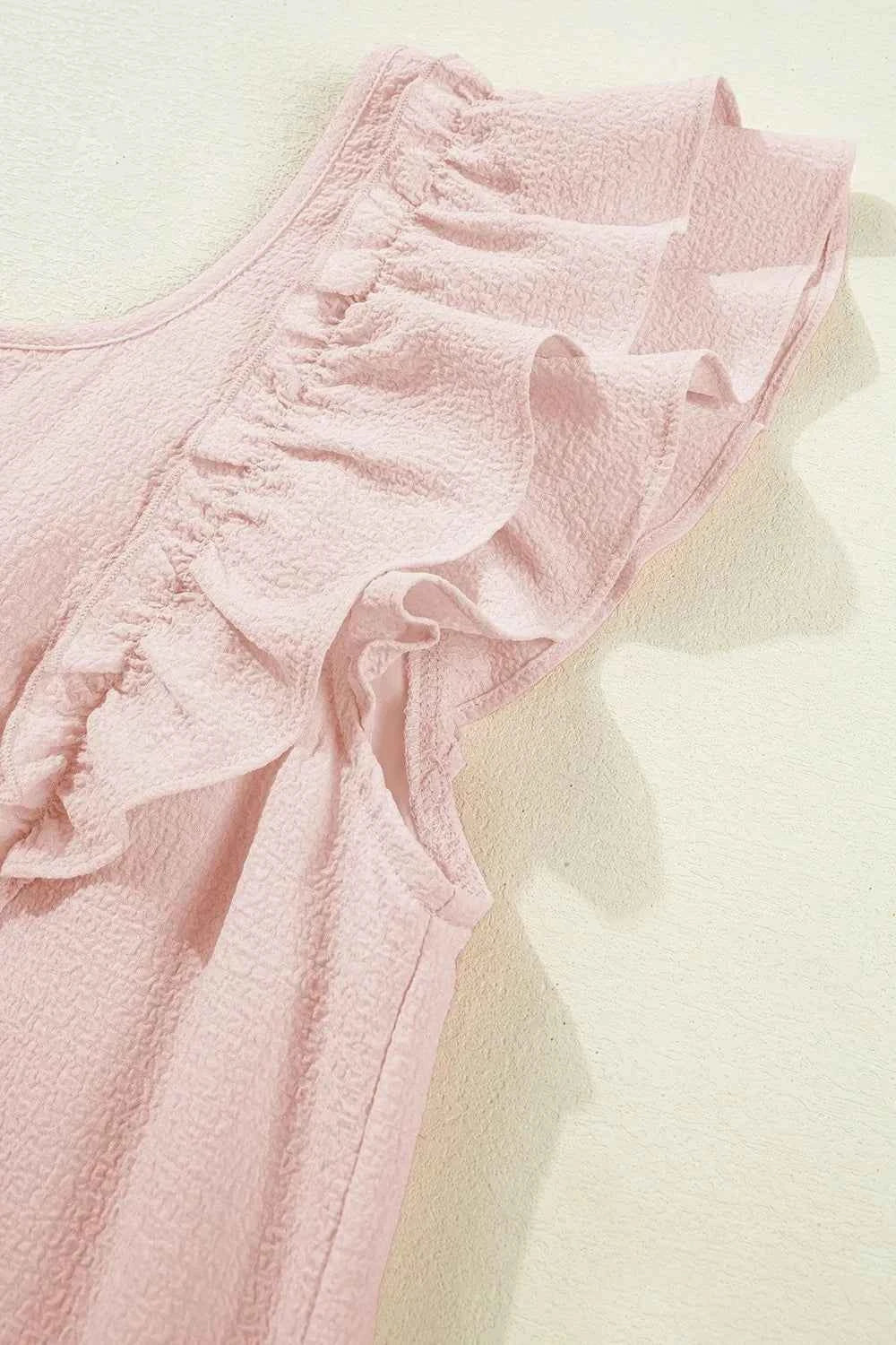 Mini-robe à volants et nœud dans le dos