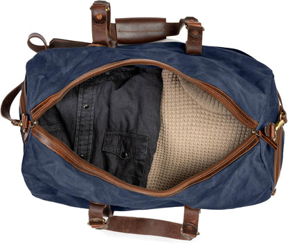 Sac de voyage Drakensberg modèle Cody, toile cirée et cuir de buffle tanndé végétal 50 L — bleu océan, kaki sable, vert forêt
