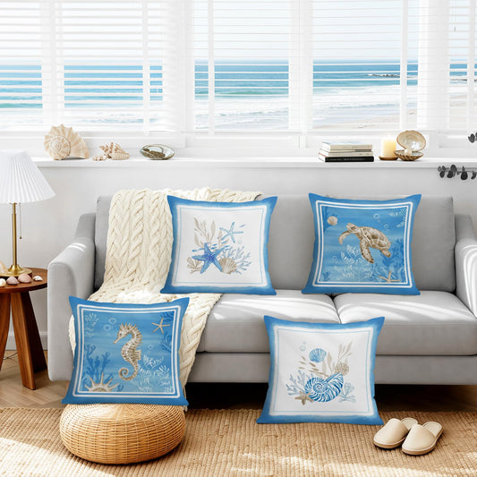 Lot de quatre housses de coussin en velours à motifs marins