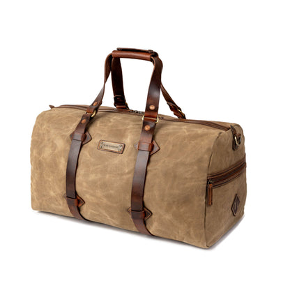 Sac de voyage Drakensberg modèle Cody, toile cirée et cuir de buffle tanndé végétal 50 L — bleu océan, kaki sable, vert forêt