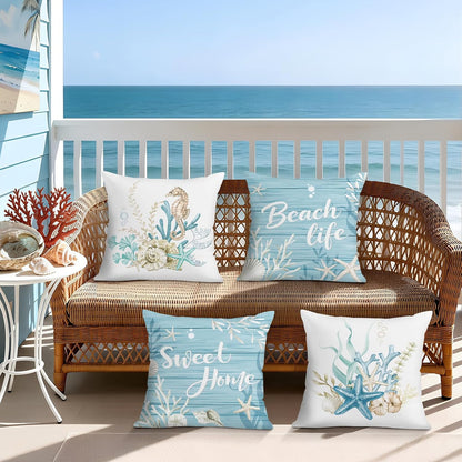 Lot de quatre housses de coussin en velours à motifs marins
