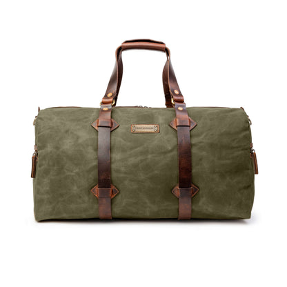 Sac de voyage Drakensberg modèle Cody, toile cirée et cuir de buffle tanndé végétal 50 L — bleu océan, kaki sable, vert forêt
