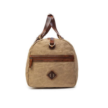 Sac de voyage Drakensberg modèle Cody, toile cirée et cuir de buffle tanndé végétal 50 L — bleu océan, kaki sable, vert forêt