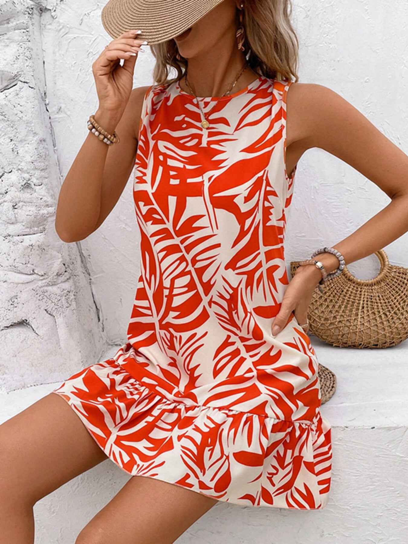 Robe courte sans manches à ourlet volanté et lien noué