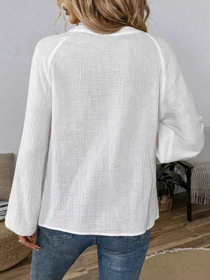 Blouse à motif paisley col cranté manches longues