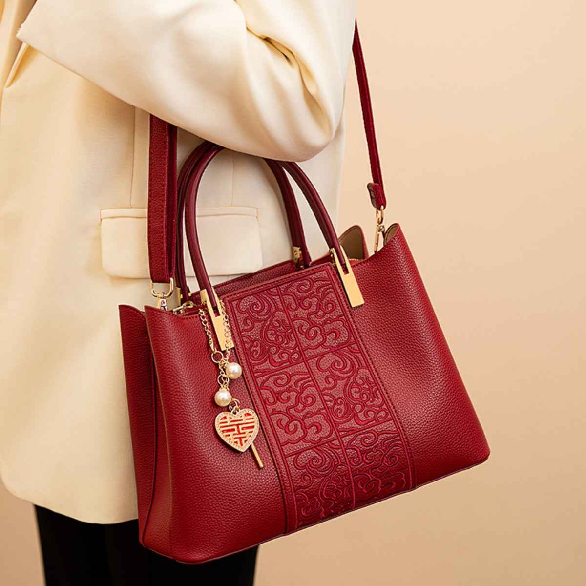 Sac à main gauffré à poignée en cuir rouge