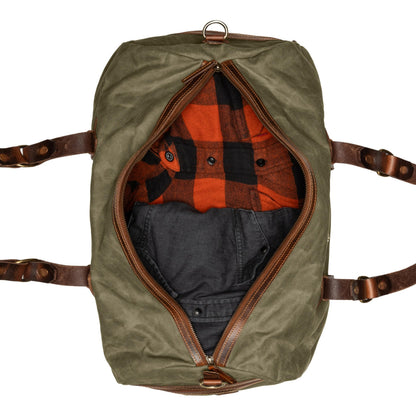 Sac de voyage Drakensberg modèle Cody, toile cirée et cuir de buffle tanndé végétal 50 L — bleu océan, kaki sable, vert forêt
