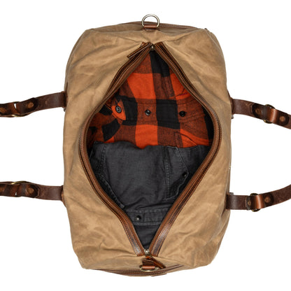 Sac de voyage Drakensberg modèle Cody, toile cirée et cuir de buffle tanndé végétal 50 L — bleu océan, kaki sable, vert forêt